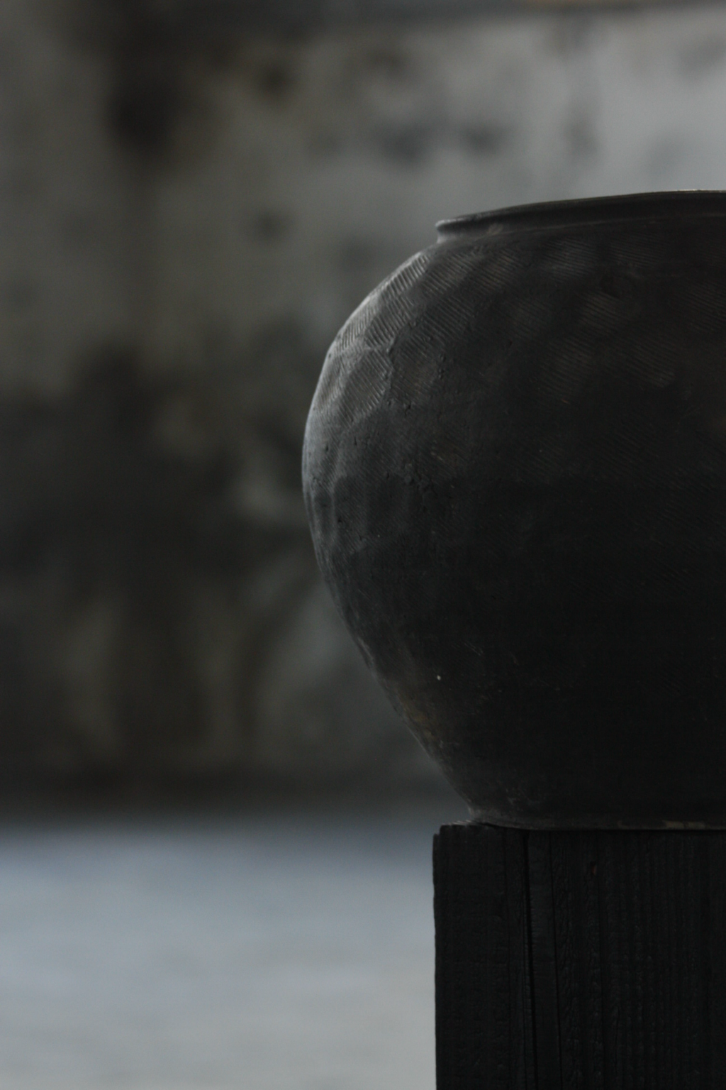 Unglazed textured vessel