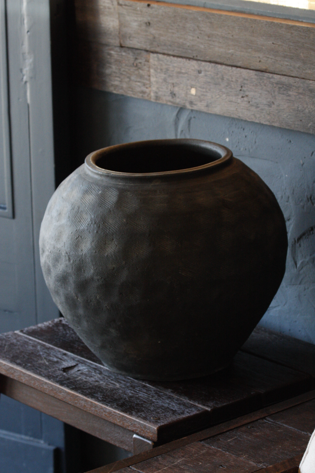 Unglazed textured vessel